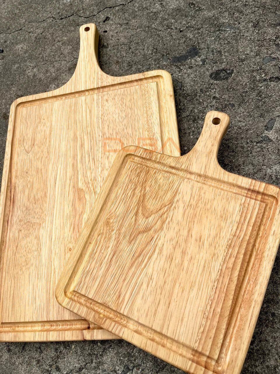 Cutting boards with handles