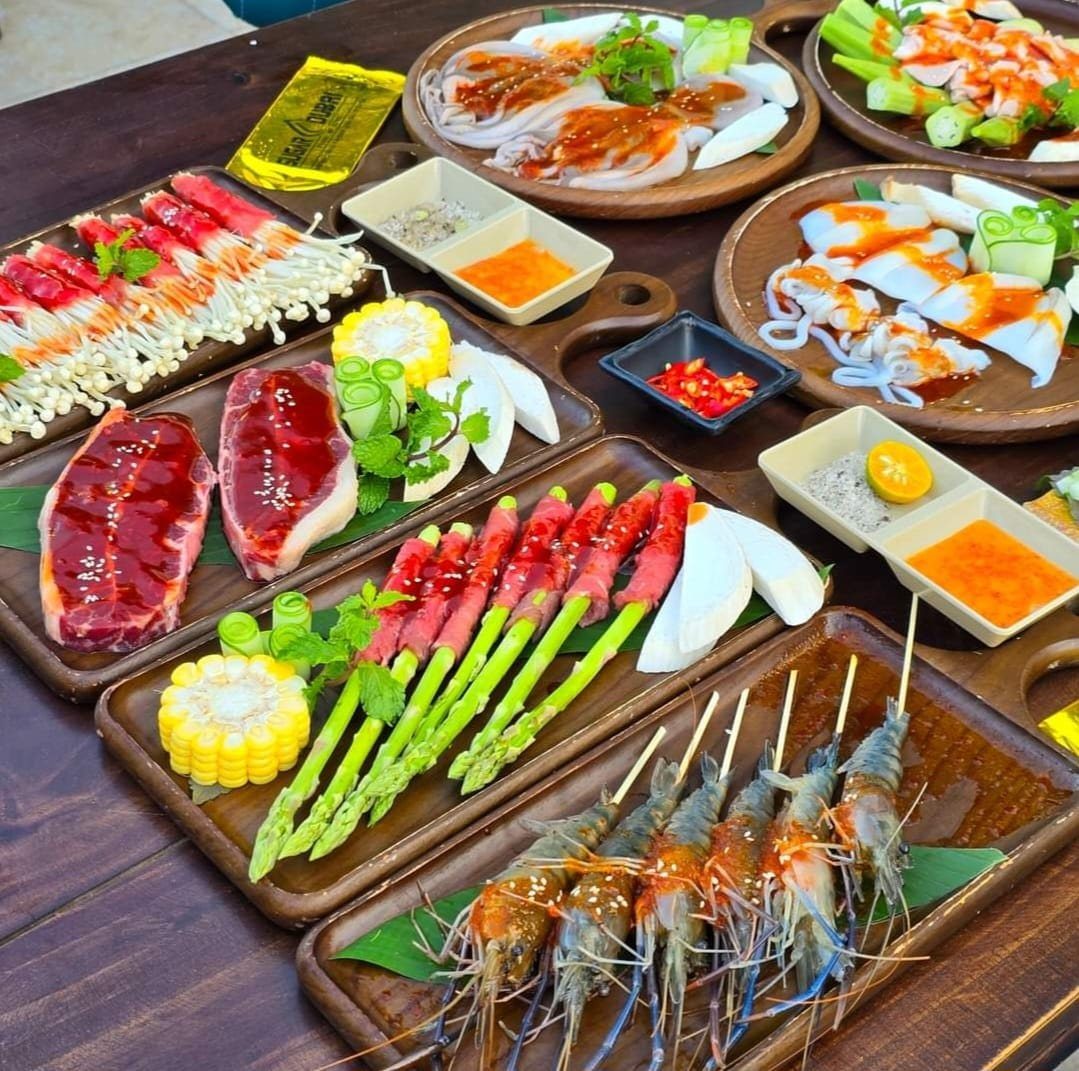 Wooden boards and trays set with food
